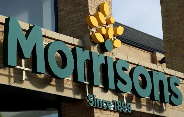 A picture of the logo of Morrisons on the front of an unknown store.