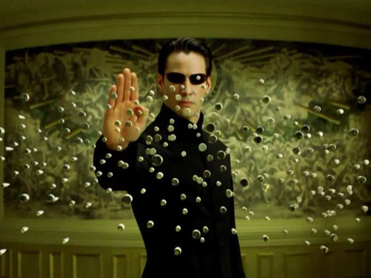 The scene from The Matrix where Neo stops all the bullets.