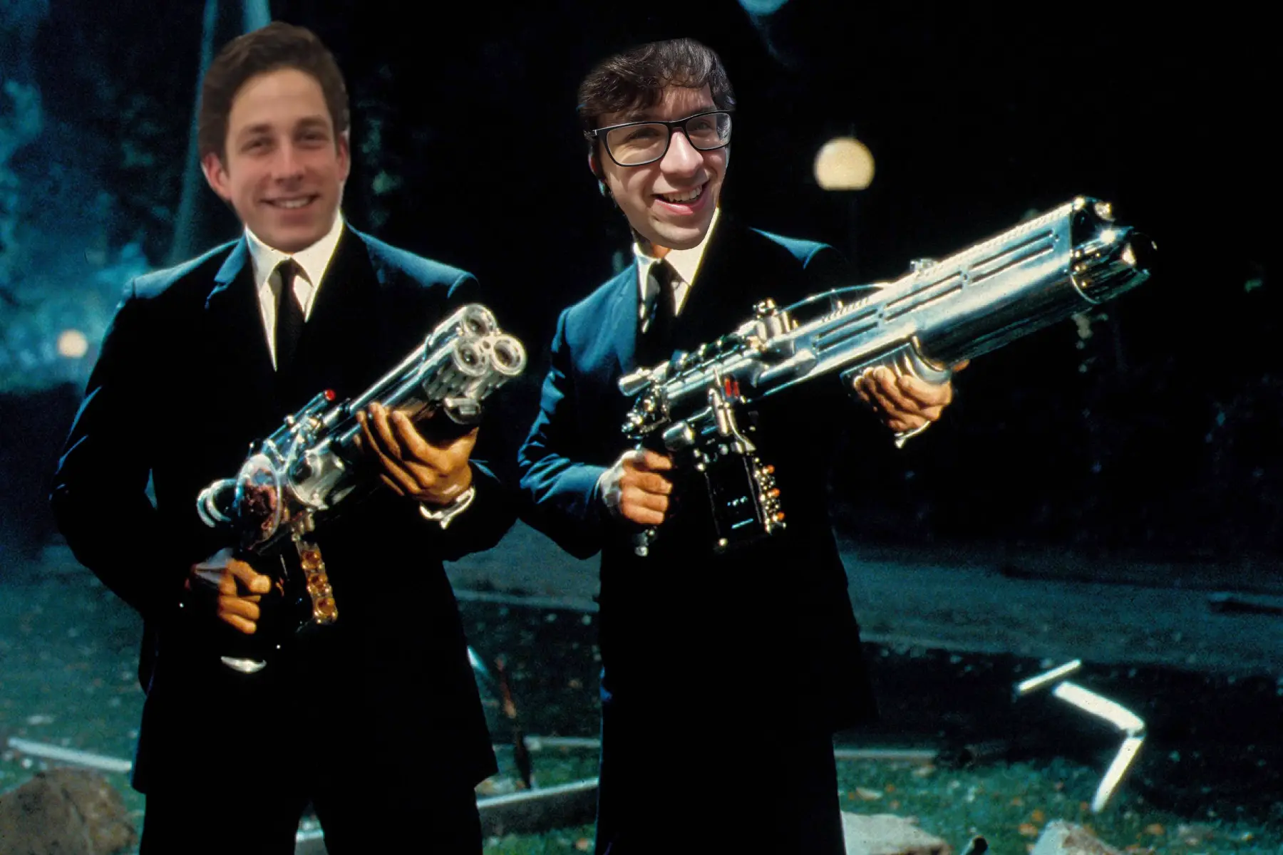 A crudely edited image where the faces of Tom de Jong and myself are pasted over the faces of the two Men in Black, Agent (de) Jay and Agent Kay, who are wielding large weapons