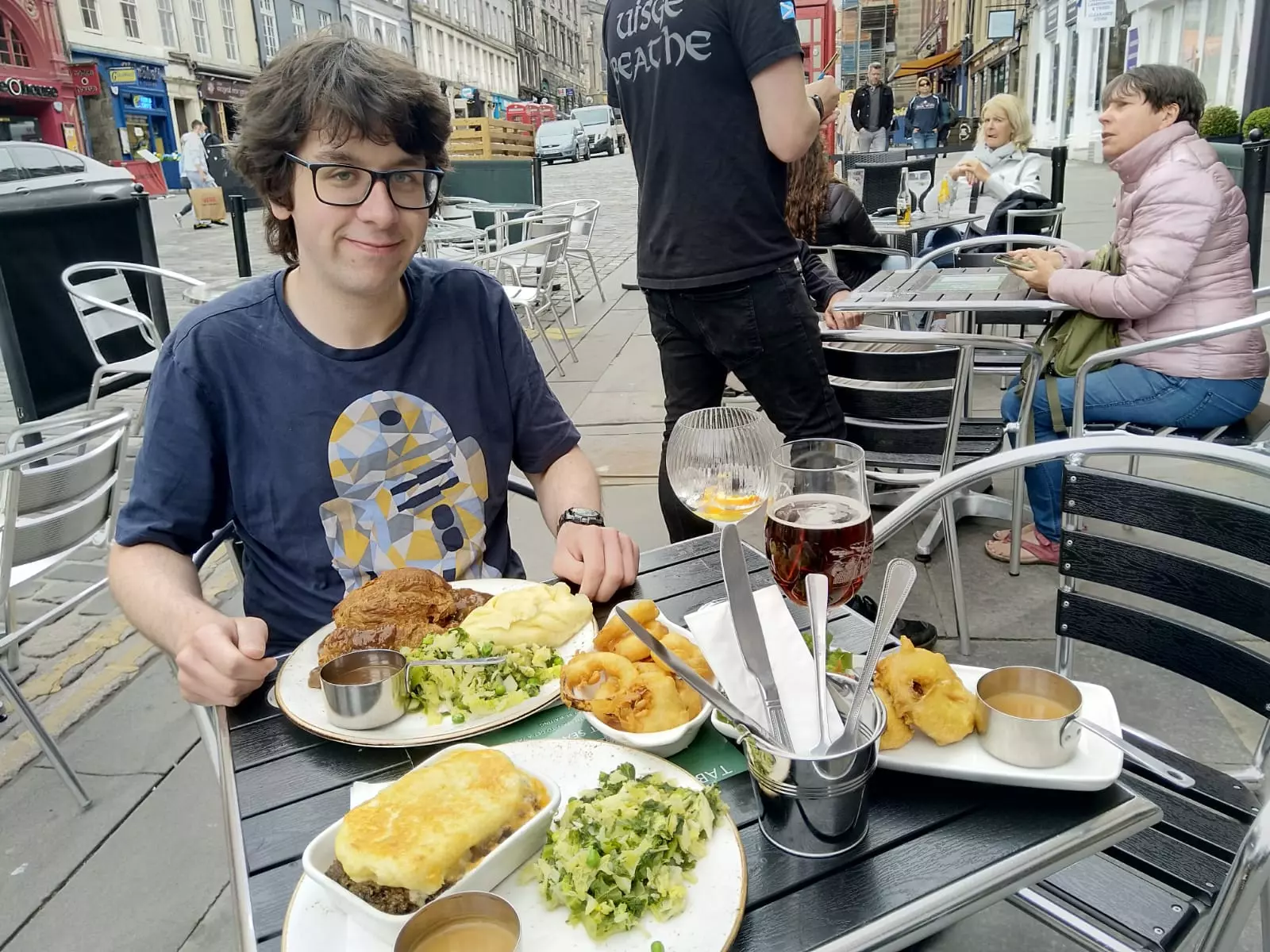 I enjoy a hearty meal on the Royal Mile.